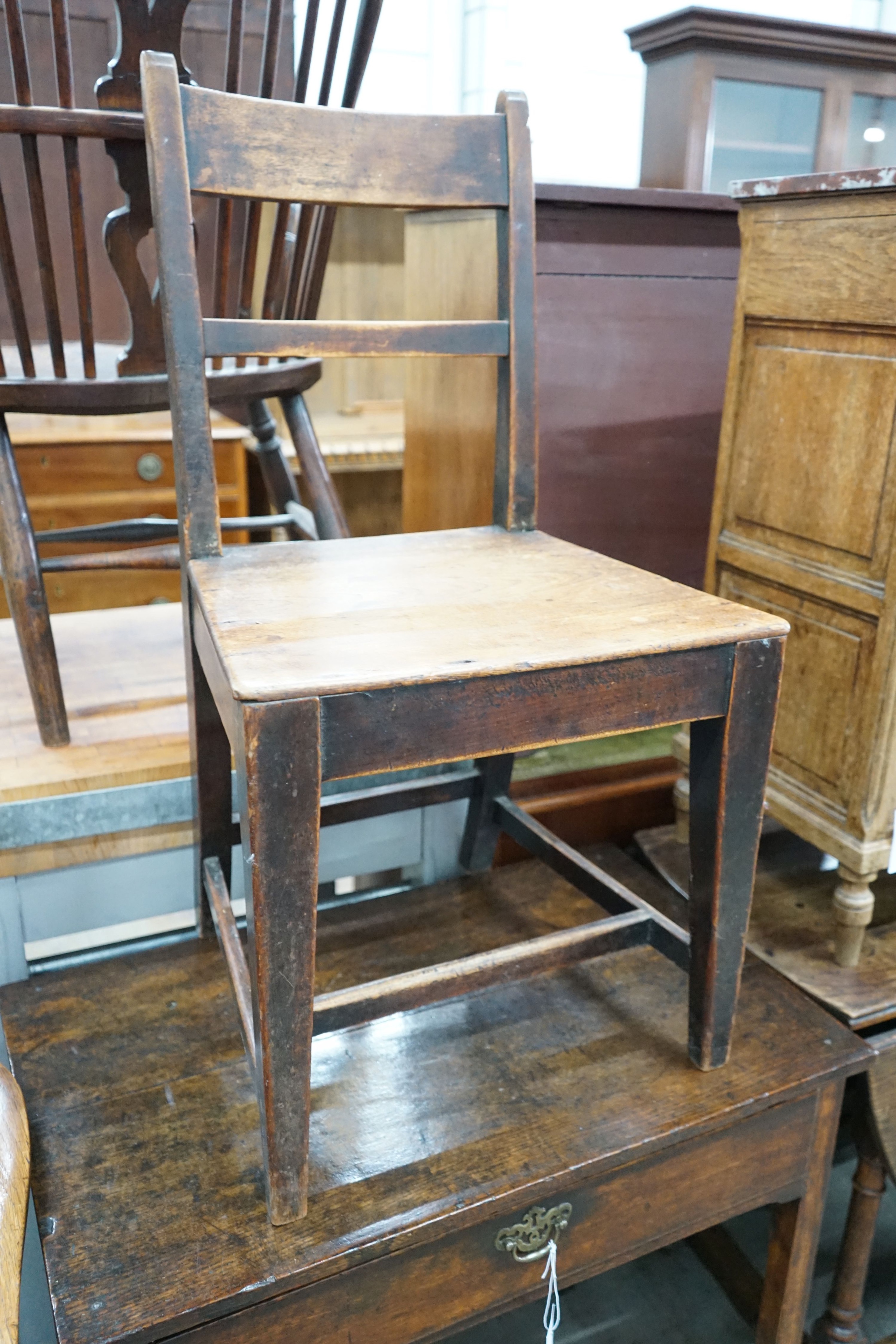 A small George III oak side table, width 75cm, depth 47cm, height 71cm and a wood seat oak chair